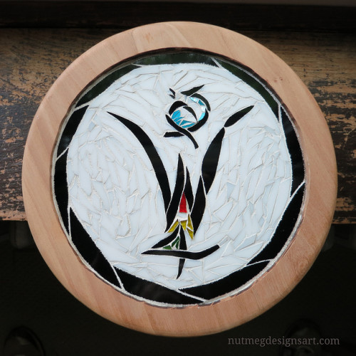 Interpretation of the logo of Tony Williams, fine woodworker, by Nutmeg Designs.