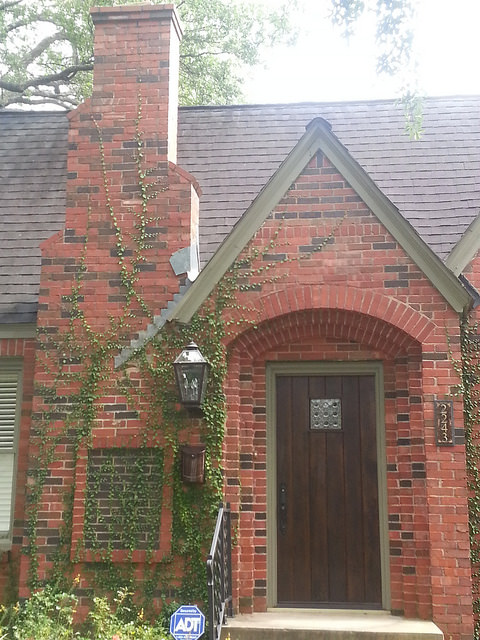 Elegant Vertical House Number for a Home with a Red Brick Chimney and Sage Green Trim, by Nutmeg Designs.