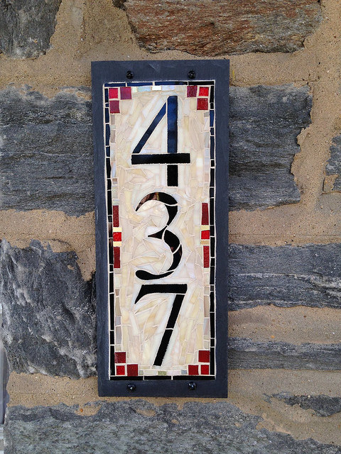 House Numbers for a Stone Home with a Red Door